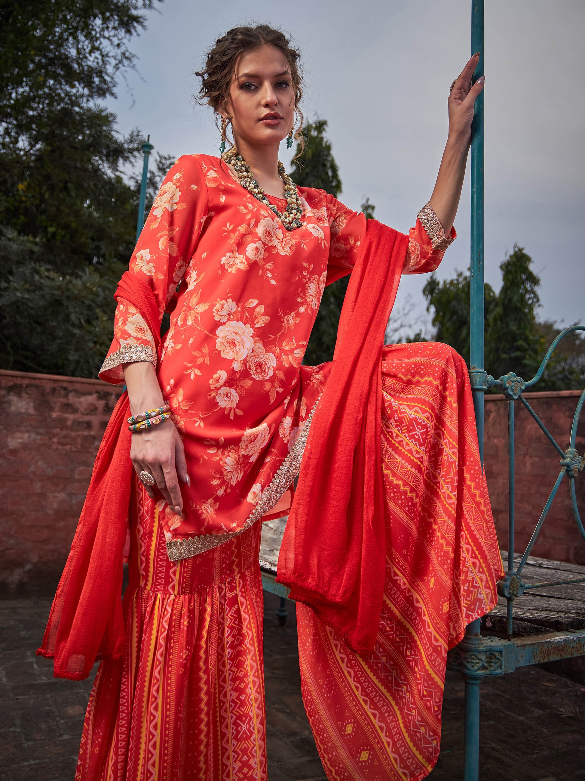 Orange Floral Short Kurta With Sharara Pants & Dupatta-Shae by SASSAFRAS