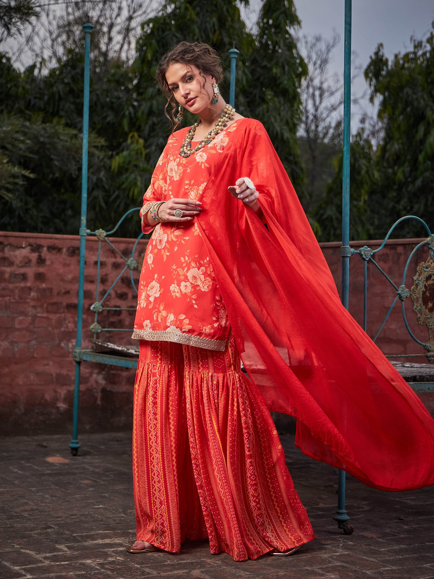 Orange Floral Short Kurta With Sharara Pants & Dupatta-Shae by SASSAFRAS